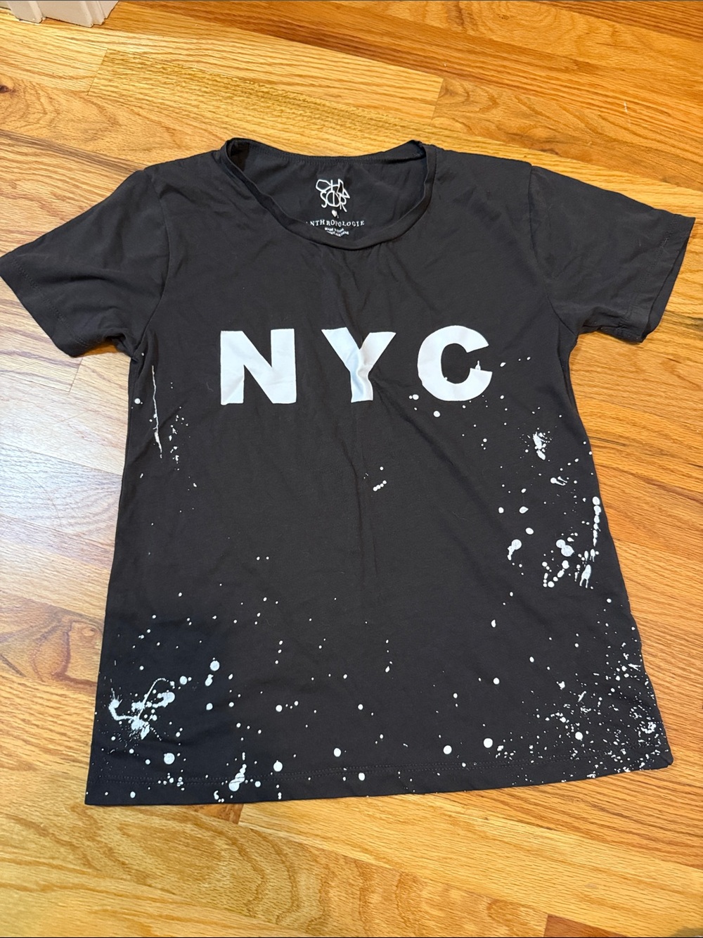Anthropologie Black NYC Graphic Tee with White Paint Splatter